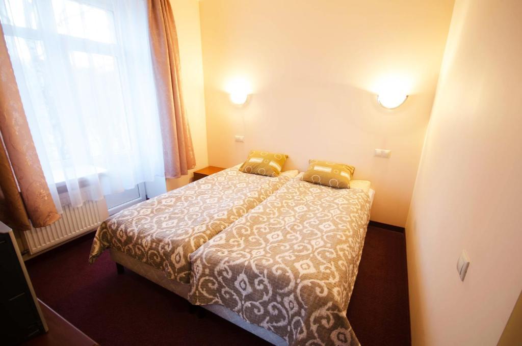 Apalenis Hotel Riga Værelse billede